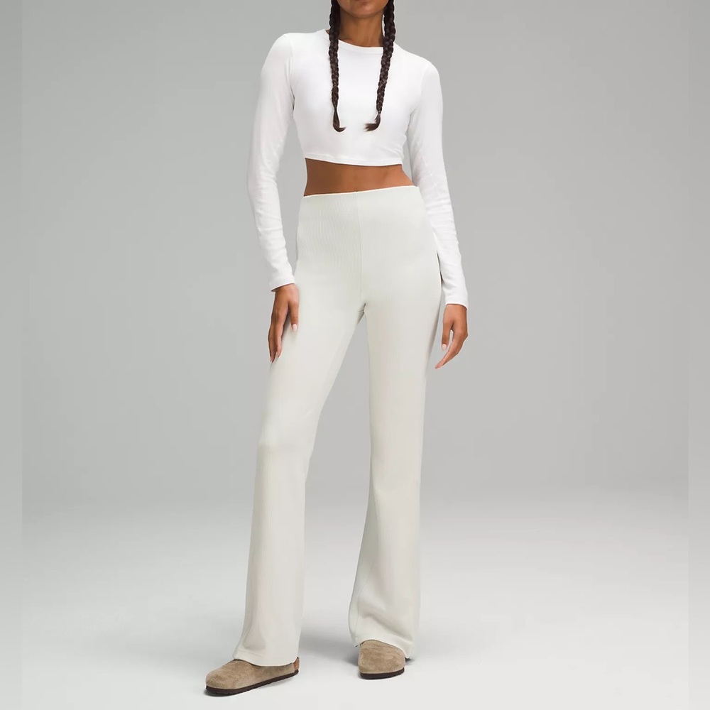 lululemon Brushed Softstreme Ribbed Zip-Flared
Pant 32.5" in color bone sz. 6!!